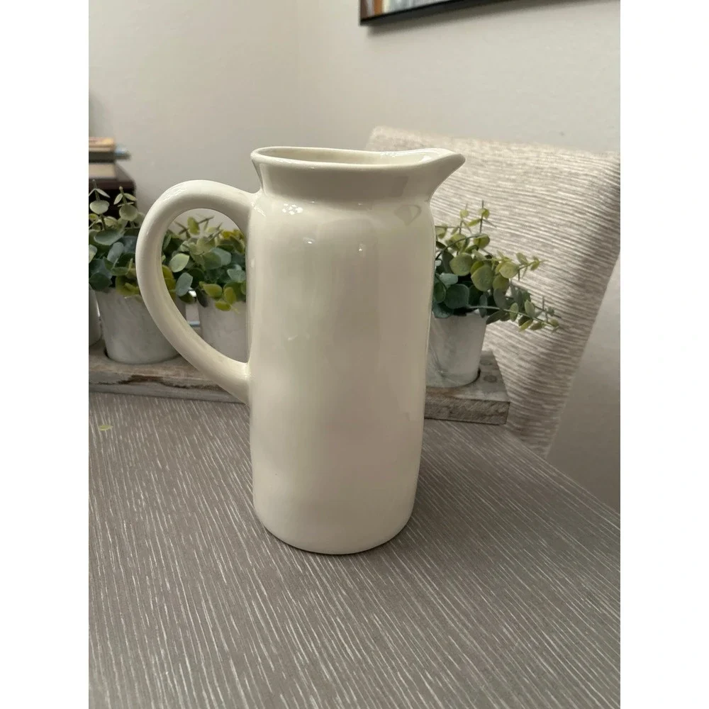Rae Dunn ceramic pitcher featuring the‎ word 